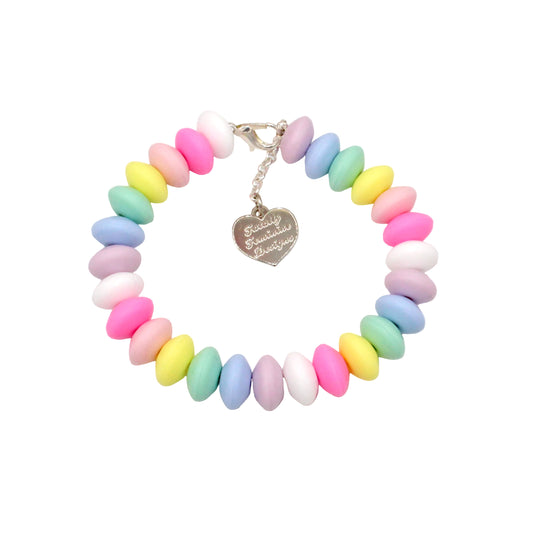Deluxe chunky pastel candy clasp bracelet with adjustable silver-finish extender chain and signature stamped metal heart logo tag.