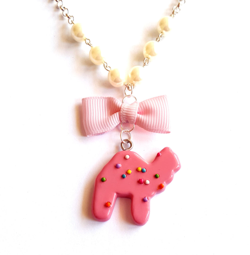 Frosted Circus Animal Cookie Bow & Pearl Necklace